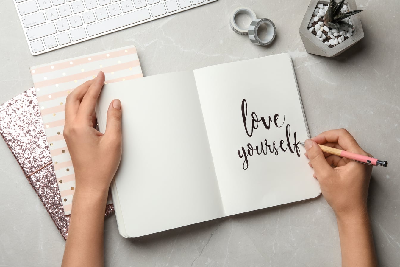 Journal with LOVE YOURSELF written on it